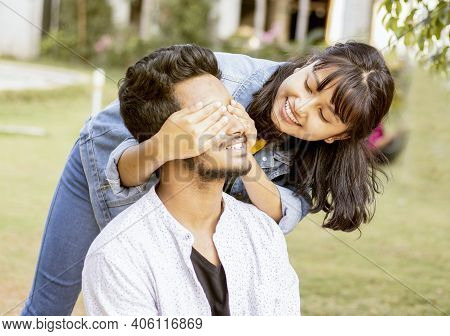 Young Girl Covering Eyes To Young Surprising Boyfriend First Meet - Happy Couple Of Lovers, Surprise