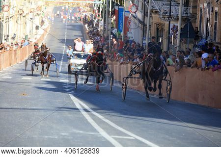Victoria, Malta - August 15, 2019: Traditional Maltese Horse Racing At Republic Street During Feast 