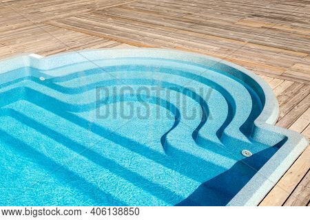 New Modern Fiberglass Plastic Swimming Pool Entrance Step With Clean Fresh Refreshing Blue Water On 