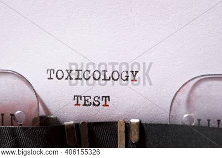 Toxicology test phrase written with a typewriter.