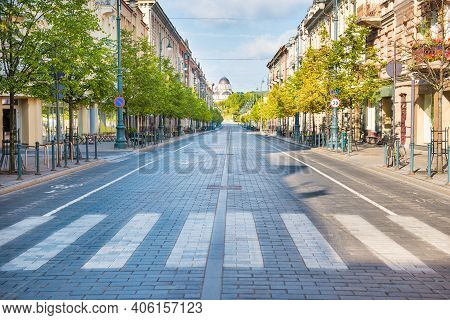 City Street With Empty Crossroad,  Road And Morning Light In Europe, Lithuania, Vilnius