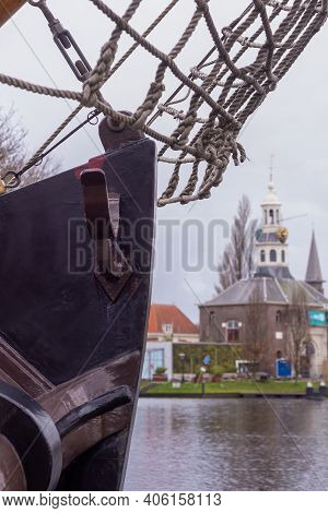Traditional Dutch Boat And Equipment  In The Canal Near The City Gate Zijlpoort, Leiden, Netherlands