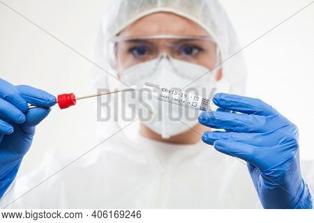 Healthcare Professional Holding Coronavirus Covid-19 Test Kit Equipment,patient Swab Sample Examinat