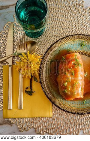 Polish Cuisine Stuffed Cabbage Roll Garnished With Fresh Dill