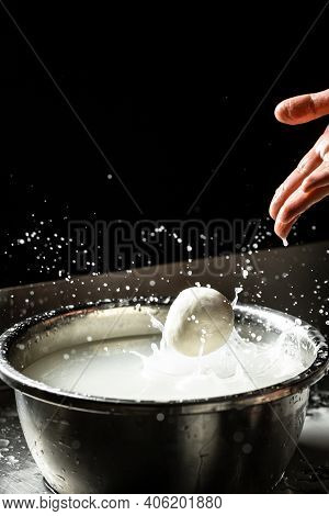 Cheesemaker Preparing Fresh Cheese. The Homemade Cheese Maker Produces Caciocavallo. Pasta Filata, T