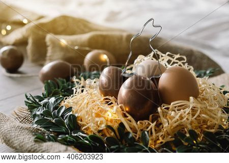 Easter Eggs And And Green Wreath. Congratulatory Easter Background. .