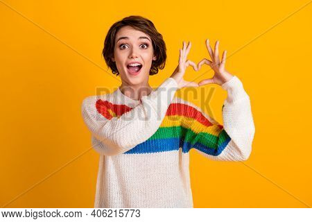 Photo Of Lovely Funny Girl Raie Arms Fingers Show Heart Figure Open Mouth Wear Striped Sweater Isola