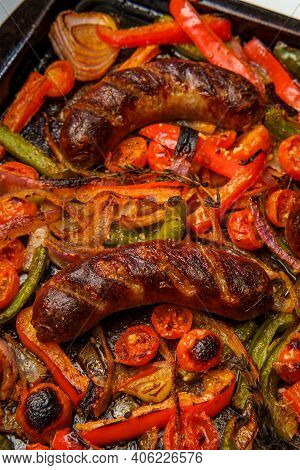 Broiled Sausage Onions And Peppers With Cherry Tomatoes And Thyme