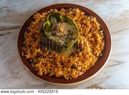 Cheesesteak Stuffed Bell Pepper With Spicy Spanish Pigeon Pea Corn Rice