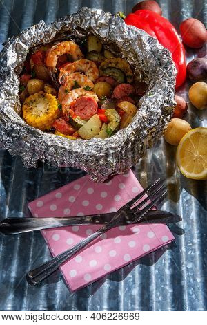 American Surf And Turf Dinner Cooked And Served In Tin Foil Packet Featuring Shrimp Multicolored New