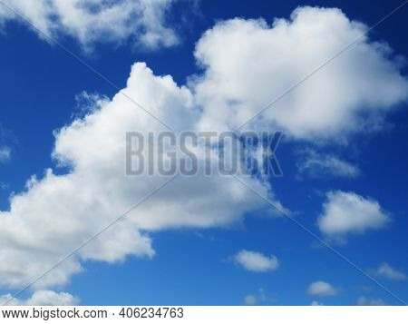 Beautiful Blue Sky And Caribbean White Cloud Background. Cottony Textured Clouds In Tropical Sky. Su