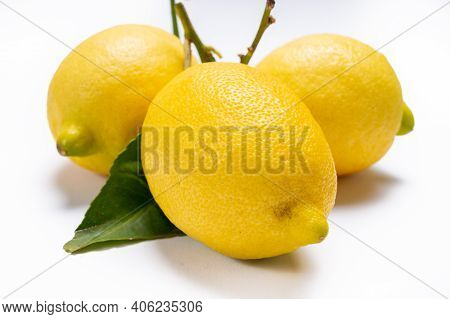Fresh Ripe Yellow Italian Lemons With Leaf, New Harvest, On White Background