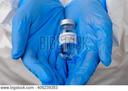 Sputnik V Vaccine For Prevention Of Coronavirus, Covid-19, Sars-cov-2 In Doctors Hands In Rubber Blu