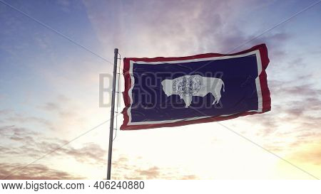State Flag Of Wyoming Waving In The Wind. Dramatic Sky Background. 3d Illustration.
