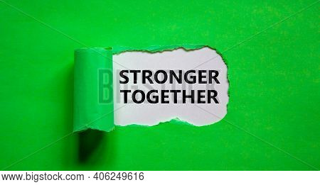 Stronger Together Symbol. Words Stronger Together Appearing Behind Torn Green Paper. Business, Motiv
