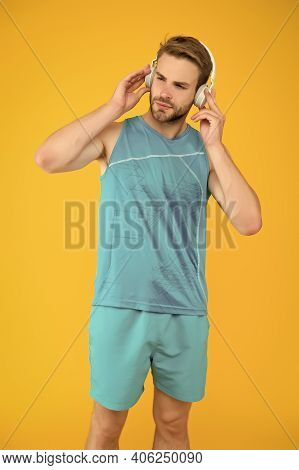 Everyone Needs A Tune-up. Sportsman Listen To Music. Sportsman Training To Tune. Strong Sportsman We