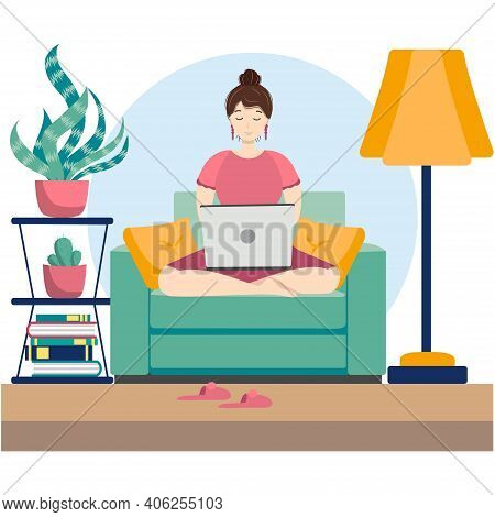 Cute Young Woman Sitting On Chair With Laptop Computer In Cozy Room. Daily Life Of Freelance Worker,
