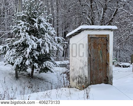 Country Toilet In The Winter Outdoors. Outdoor Toilet Construction. Cabin - Toilet In The Forest On