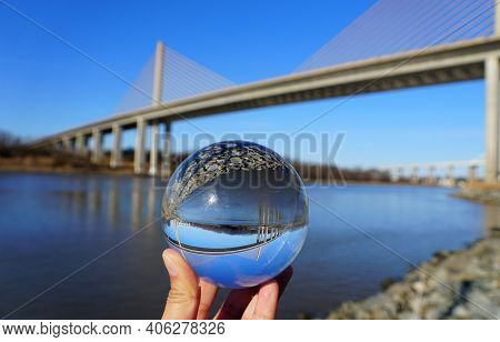 The William V Roth Bridge Above The Chesapeake Canal Captured Through A Crystal Lens Ball Near Middl