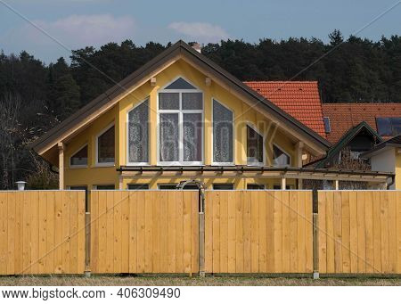 Single Family Detached Home Building With Fence