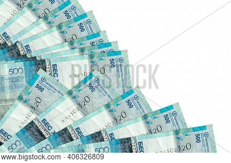 500 Kazakhstani Tenge Bills Lies Isolated On White Background With Copy Space Stacked In Fan Close U