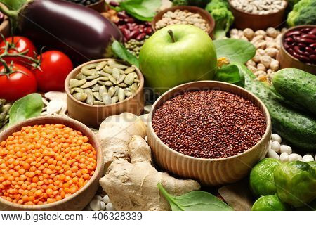 Different Vegetables, Seeds And Fruits As Background, Closeup. Healthy Diet