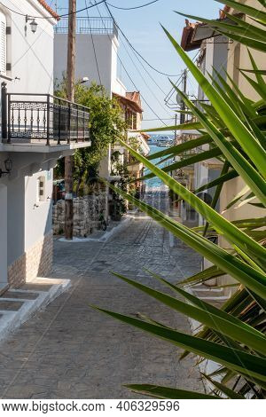 Small Street With Sea Background And Green Plant. Dreamy With Little Balconys
