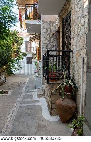 Small Street With Sea Background And Green Plant. Dreamy With Little Balconys