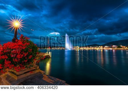 Amazing Night View Of Jet Deau From The Paquis. The Fountain Is One Of Most Famous Tourist Attractio