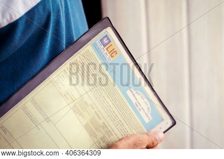 West Bengal, India, January 28, 2021 : Lic Stock Image Background. Person Or A Man Holding Life Insu