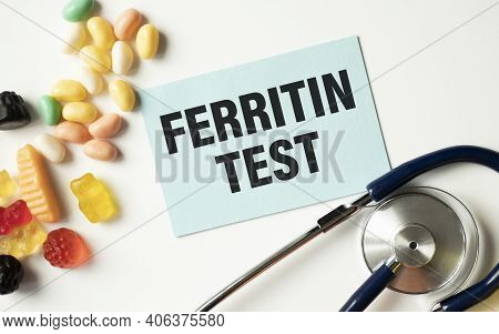 Ferritin Blood Test Word, Medical Term Word With Medical Concepts In Paper And Medical Equipment Bac