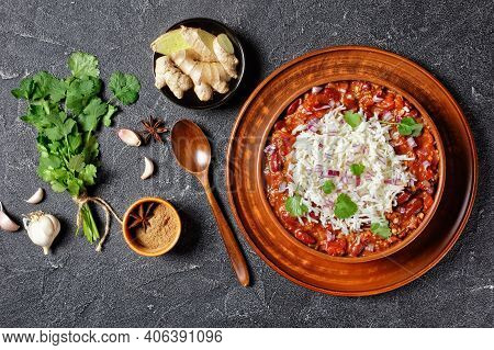 Rajma Red Bean Masala, Red Bean Kidney Curry, With Rice In A Clay Bowl On A Concrete Table With Ingr
