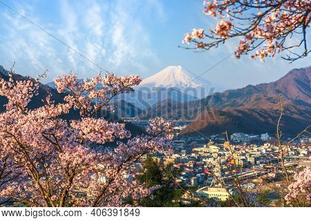 Otsuki, Japan cityscape with Mt. Fuji in spring season with cherry blossoms.