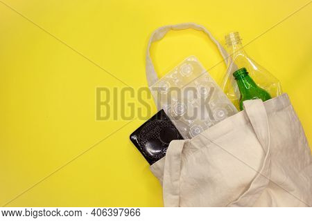Sorting Waste In Canvas Bag. Resyclable Flatlay. Waste Segregation. Environmental Awareness.