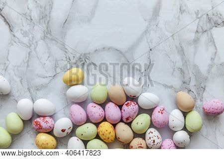 Happy Easter Concept. Preparation For Holiday. Easter Pastel Candy Chocolate Eggs Sweets On Trendy G