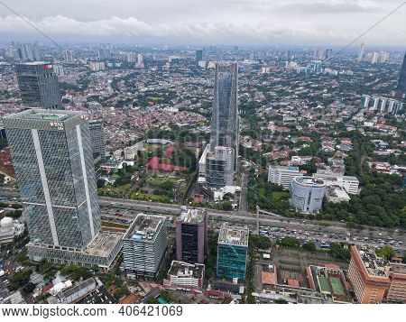 Aerial View Of Bni Life Building In Jakarta And Noise Cloud With Cityscape. Bni Life Is The Best Ins