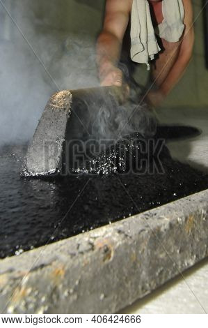 Hot Liquid Mastic Asphalt On The Floor