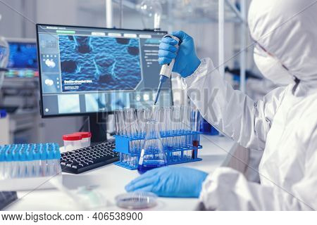 Micropipette Used By Medical Researcher In Laborator In Time Of Coronavirus Dressed In Protection Su