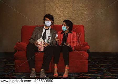New Normal Cinema : Caucassian Couple A Man And An African-american Woman Waiting For Screening Toge