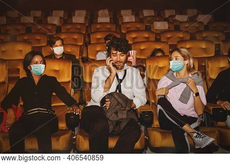 Man Talking On The Phone And Not Wearing A Coronavirus Mask The Global Epidemic Covid-19 Sits In The