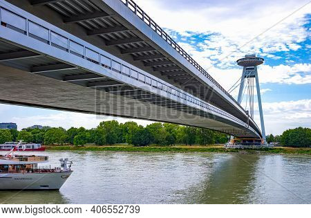 Bratislava, Slovakia - July 9, 2019: The Modern Snp Bridge Seen From The Danube River Bank