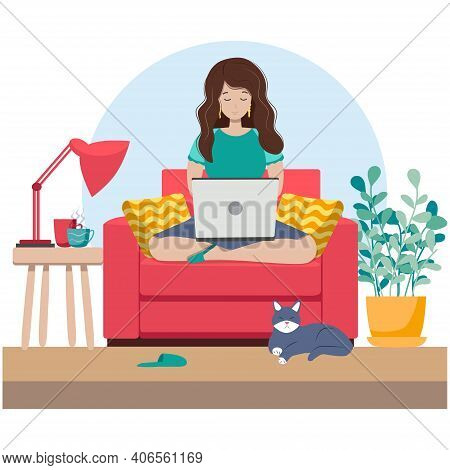 Cute Young Woman Sitting On Chair With Laptop Computer In Cozy Room. Daily Life Of Freelance Worker,