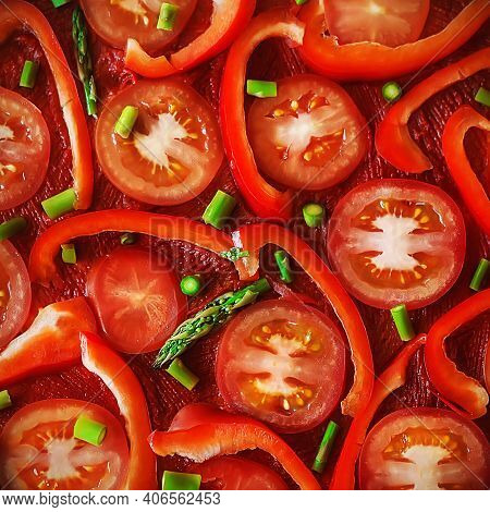 Top View Of A Vegetarian Italian Dish With Sliced Tomatoes, Bell Peppers, Green Fresh Asparagus And 