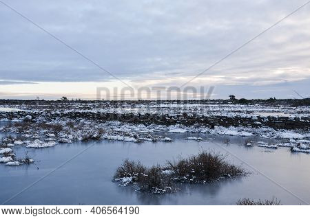 Flooded And Icy Landscape At The Stora Alvaret On The Island Of Oland In Sweden