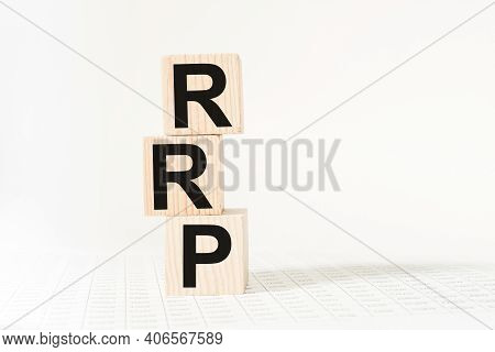 A Word Rrp On Wooden Cubes. Business Concept. Business And Finance
