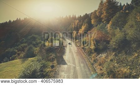 Mountain Hill Country Road Car Drive Aerial View. Roadside Automobile Highland Scenery Landscape Overview. Dense Green Forest Unpolluted Natural Environment Concept.