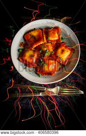 Italian Ravioli With Tomato Sauce Exciting Celebration With Neon Light Trails