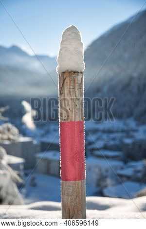Post At Footpah On Winter Hiking Trail After Snowfall At Davos Switzerland