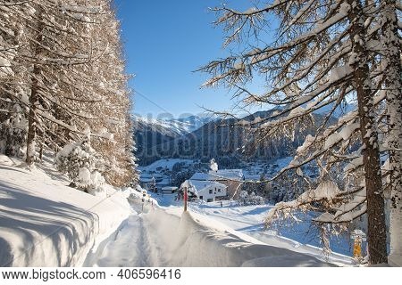 Post At Footpah On Winter Hiking Trail After Snowfall At Davos Switzerland