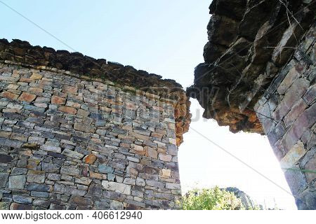 The Stones Of These Two Constructions Seem To Come Closer, They Want To Be One.